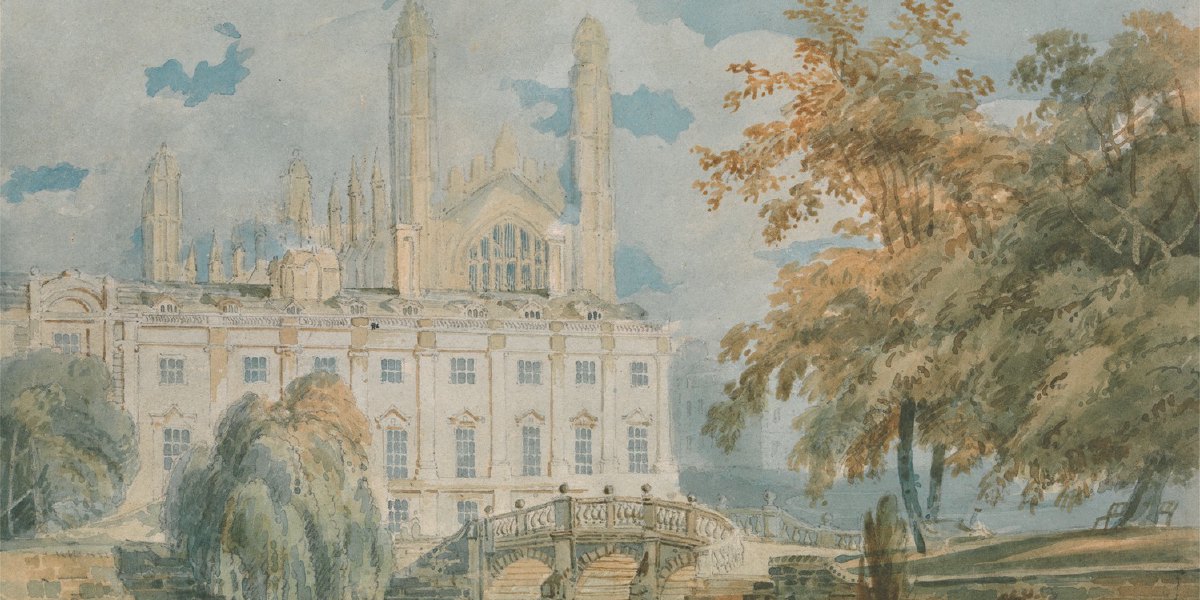 Clare Hall seen across water, with pale Gothic architecture framed by autumn trees